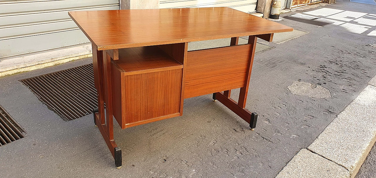 Teak centre desk with brass feet, 1960s 11