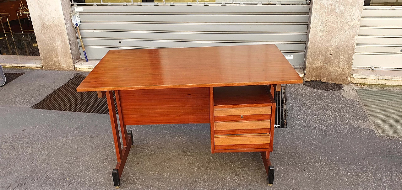 Teak centre desk with brass feet, 1960s 13