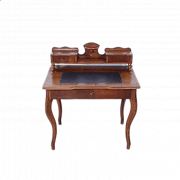 Walnut panelled desk with curved legs, mid-19th century