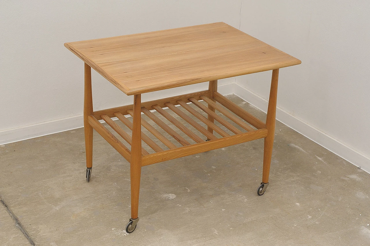 Beech coffee table with casters by Krásná Jizba, 1950s 3