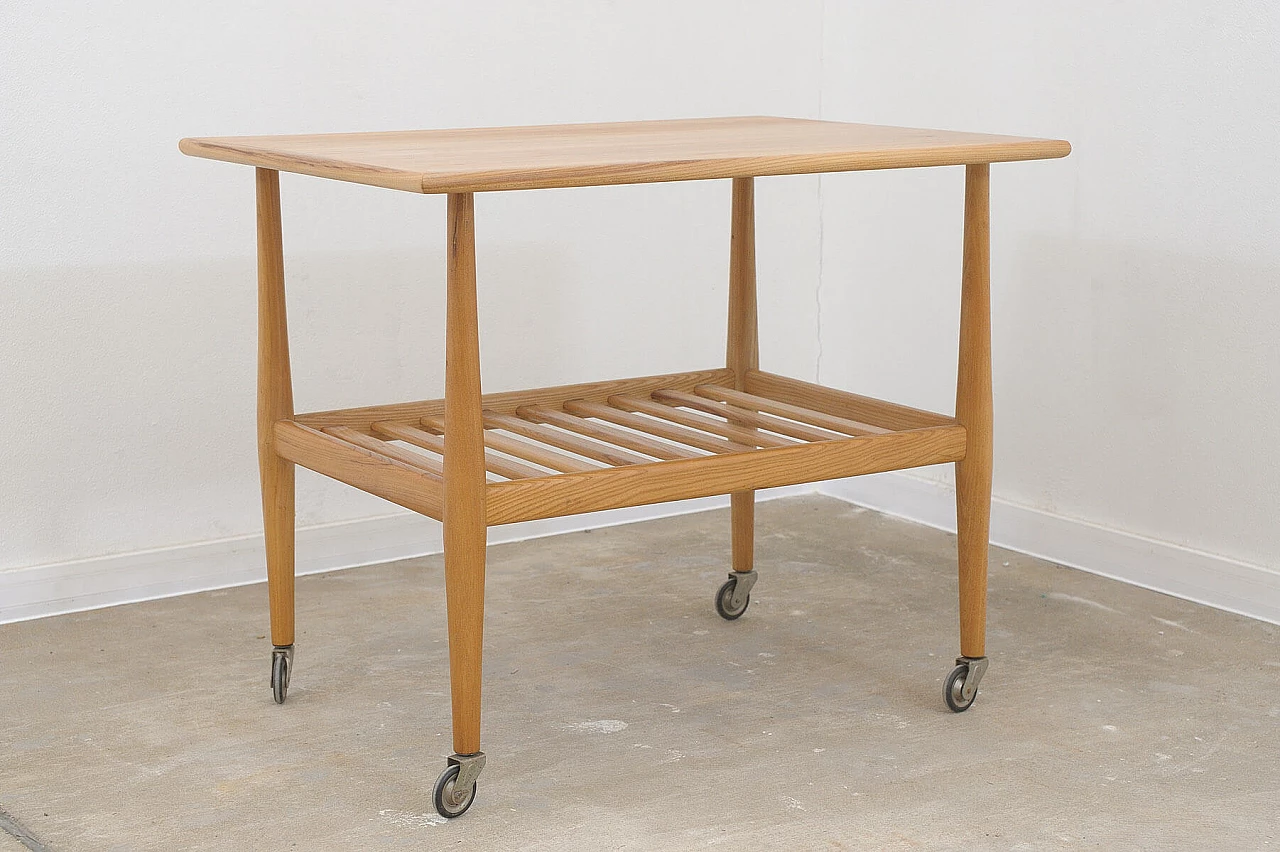 Beech coffee table with casters by Krásná Jizba, 1950s 4