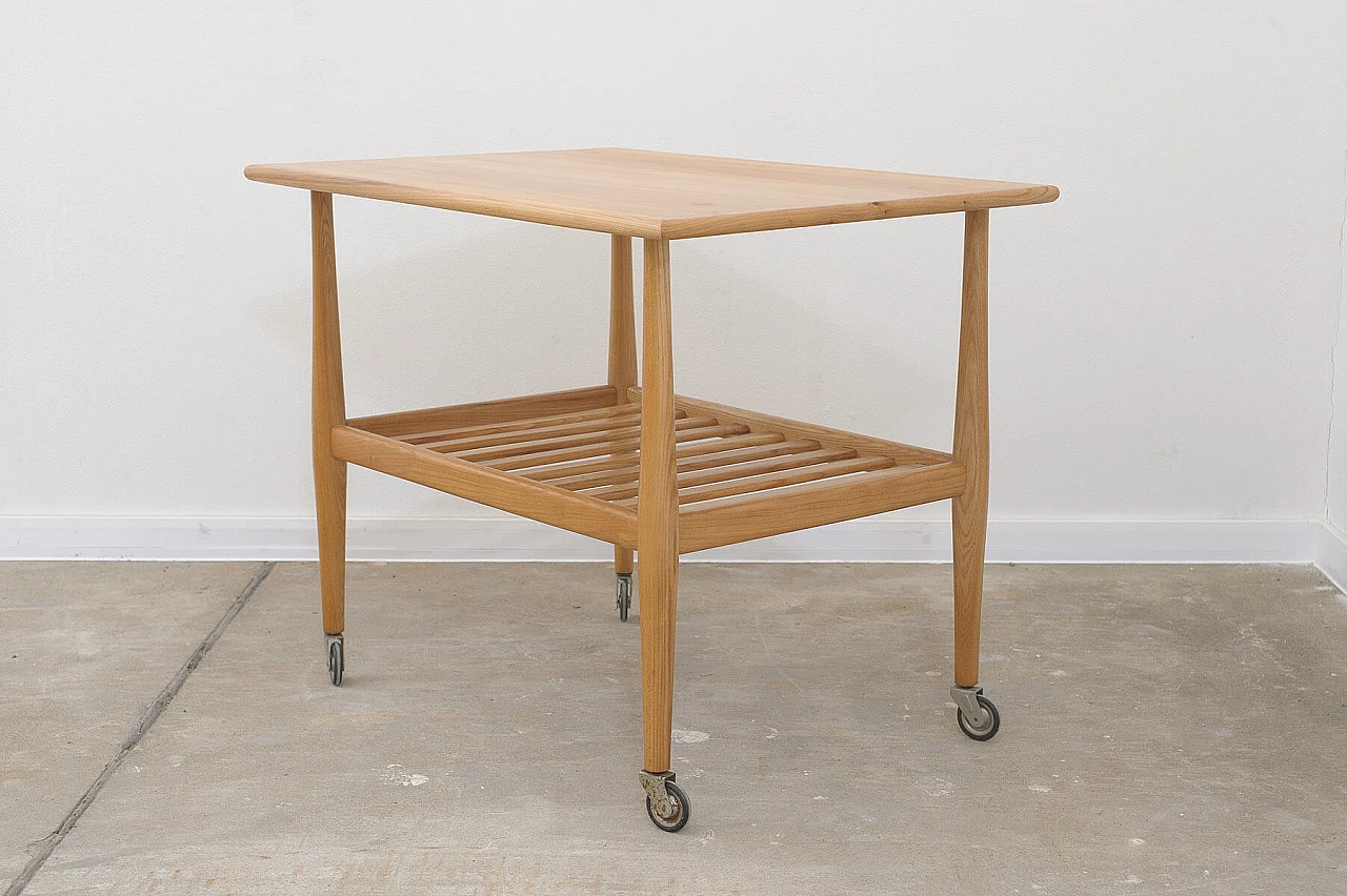 Beech coffee table with casters by Krásná Jizba, 1950s 6