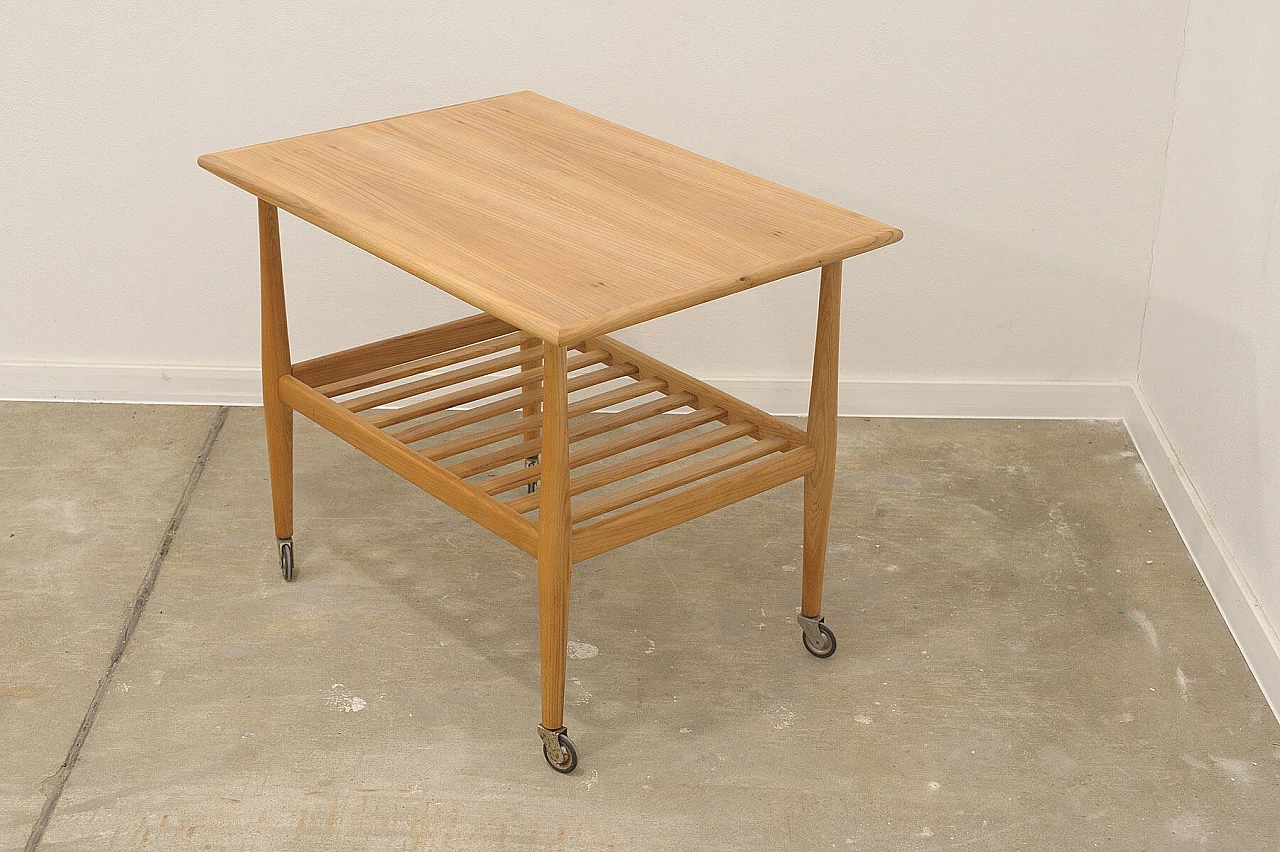 Beech coffee table with casters by Krásná Jizba, 1950s 7