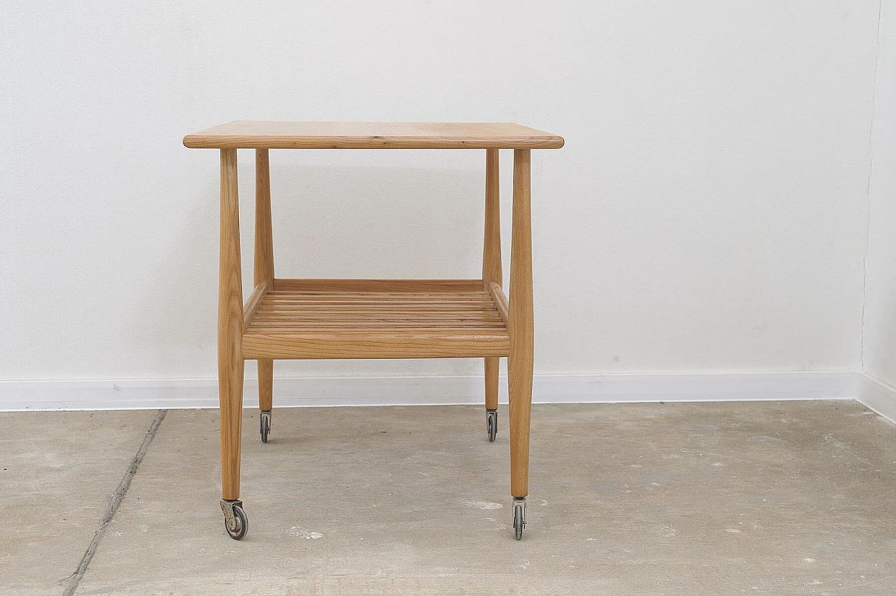 Beech coffee table with casters by Krásná Jizba, 1950s 8