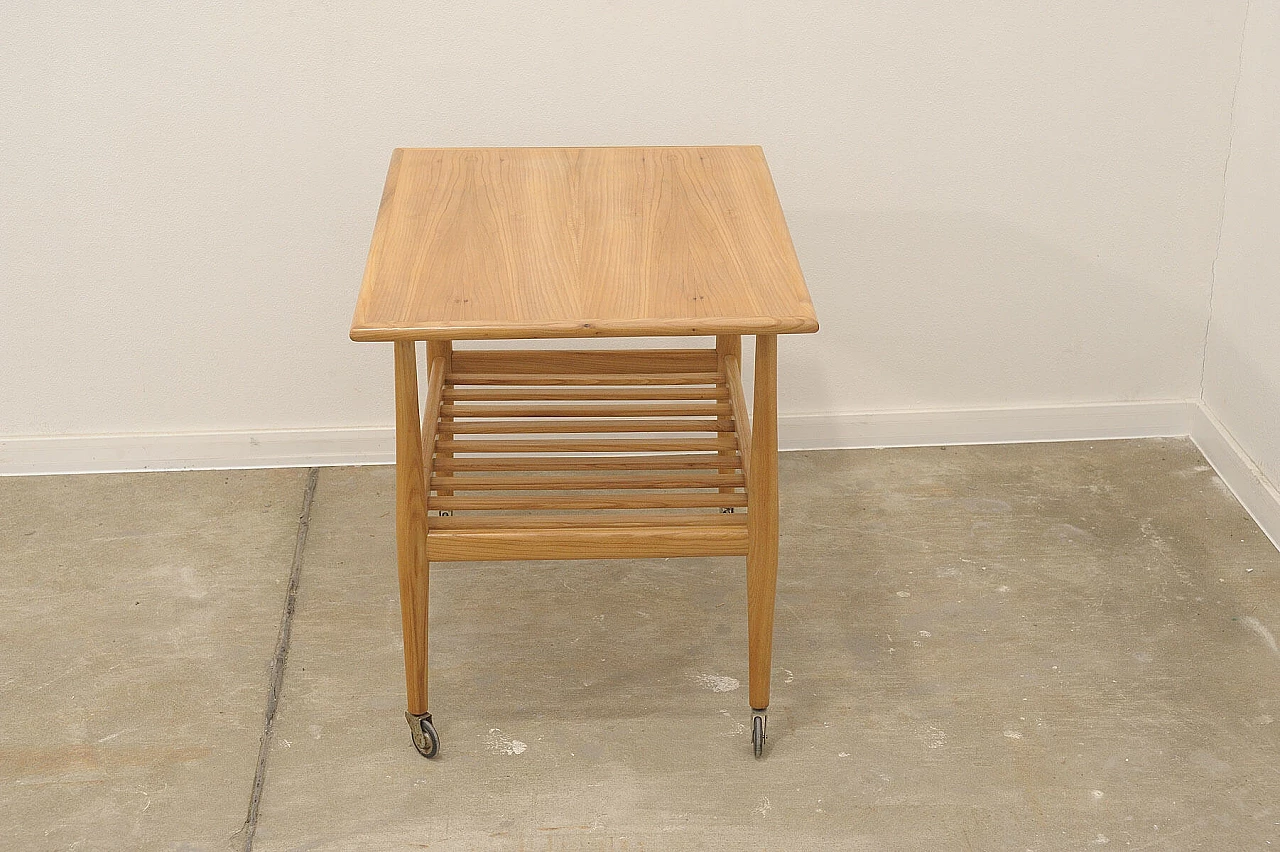 Beech coffee table with casters by Krásná Jizba, 1950s 9