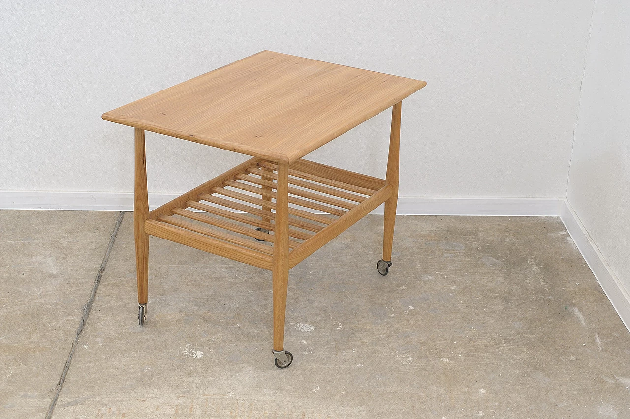 Beech coffee table with casters by Krásná Jizba, 1950s 10