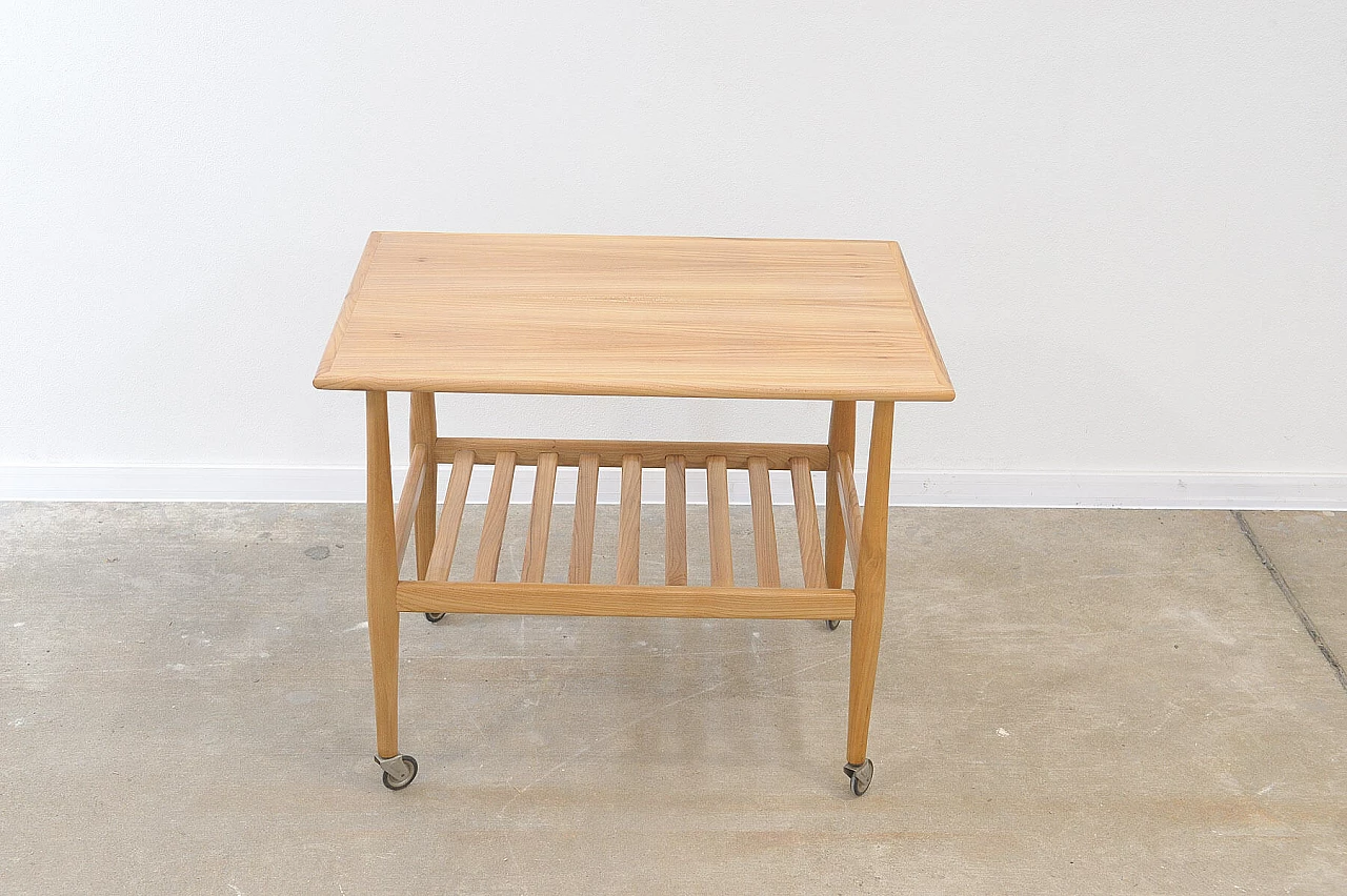 Beech coffee table with casters by Krásná Jizba, 1950s 11
