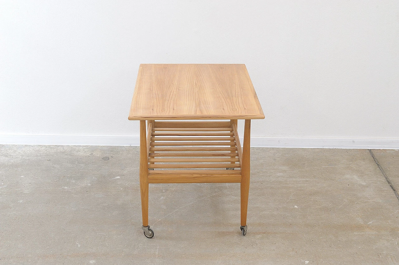 Beech coffee table with casters by Krásná Jizba, 1950s 15