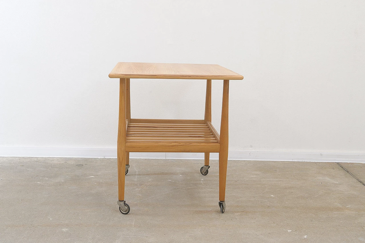 Beech coffee table with casters by Krásná Jizba, 1950s 16