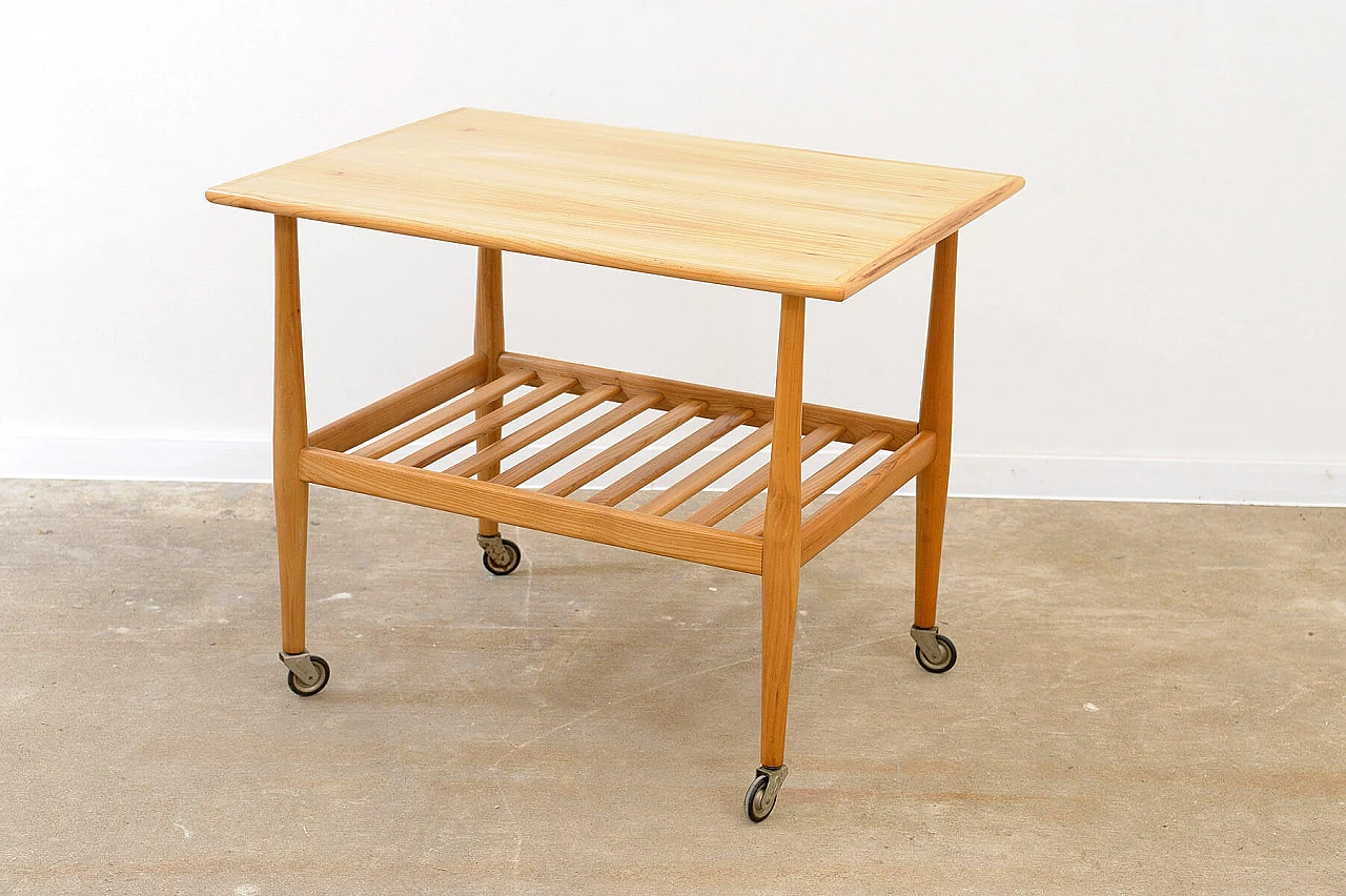 Beech coffee table with casters by Krásná Jizba, 1950s 17