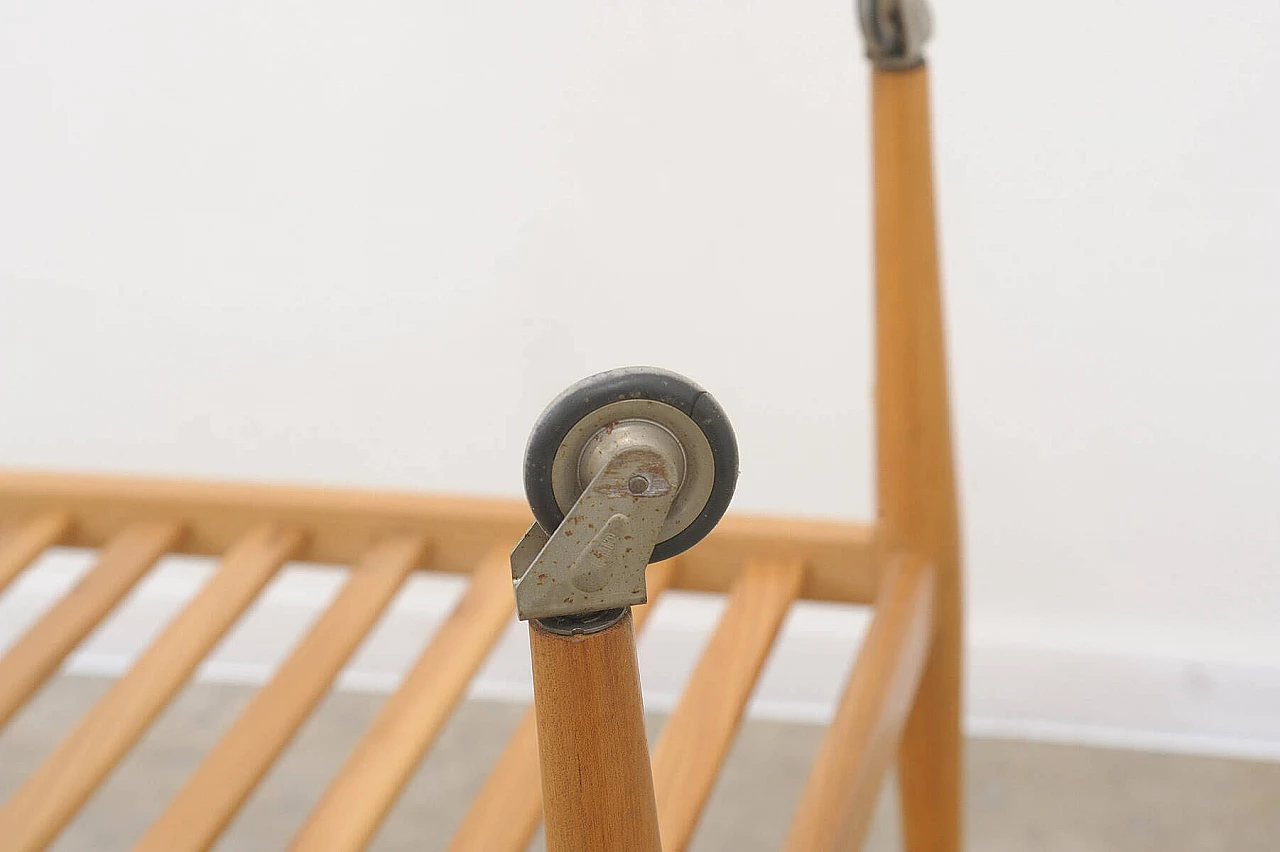 Beech coffee table with casters by Krásná Jizba, 1950s 18