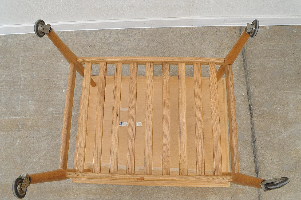 Beech coffee table with casters by Krásná Jizba, 1950s 21