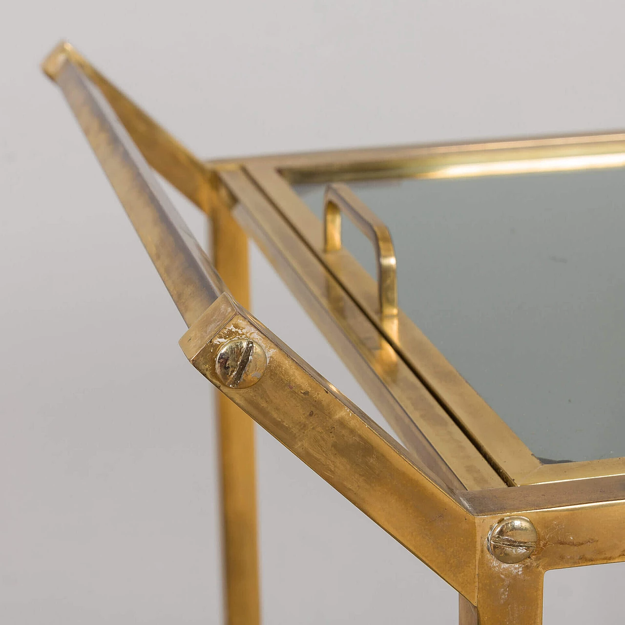 Brass and smoked glass bar cart with removable tray, 1960s 11