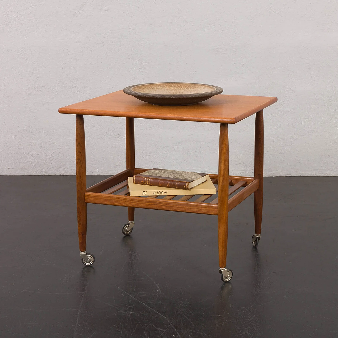 Danish teak coffee table with double shelf and casters, 1960s 1