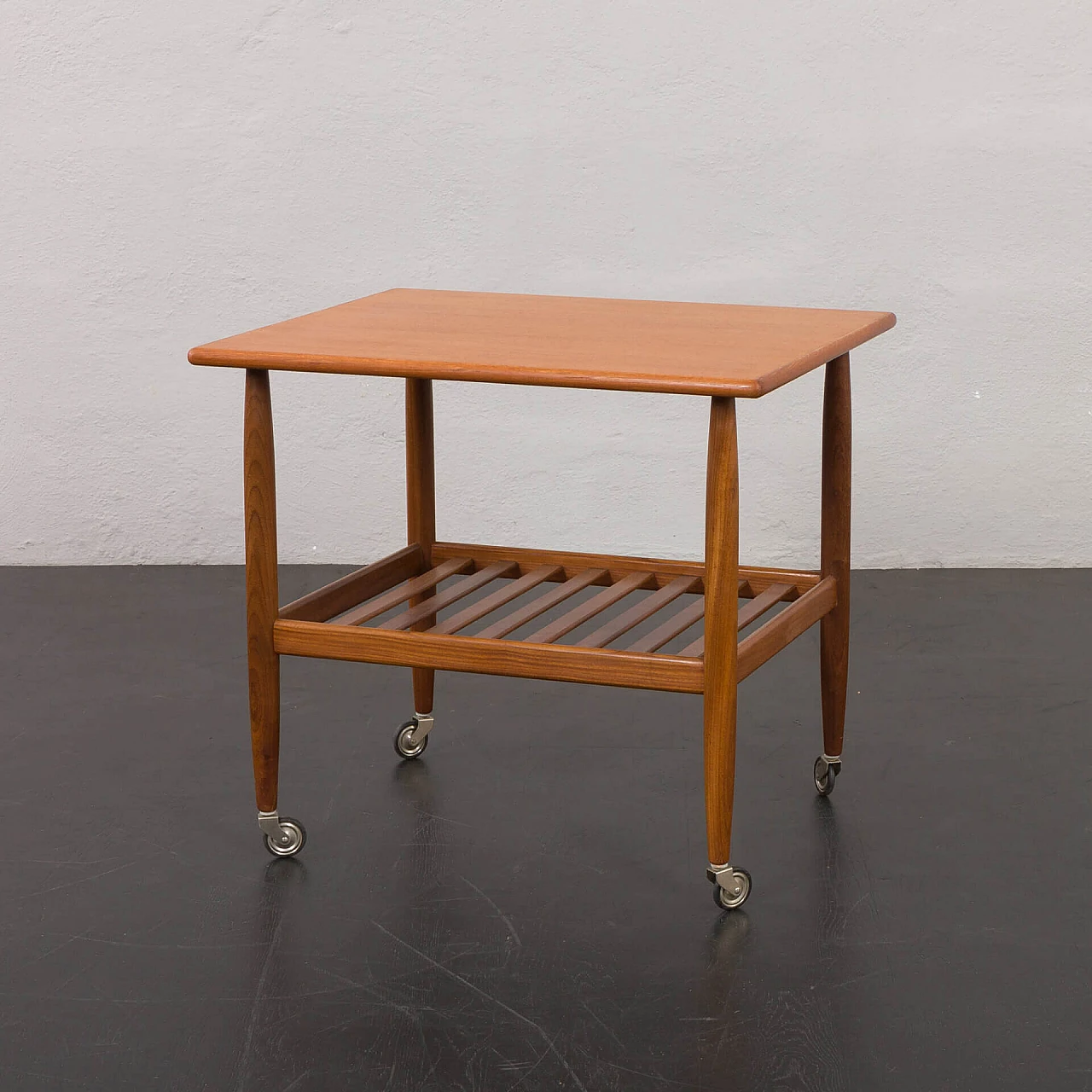 Danish teak coffee table with double shelf and casters, 1960s 2