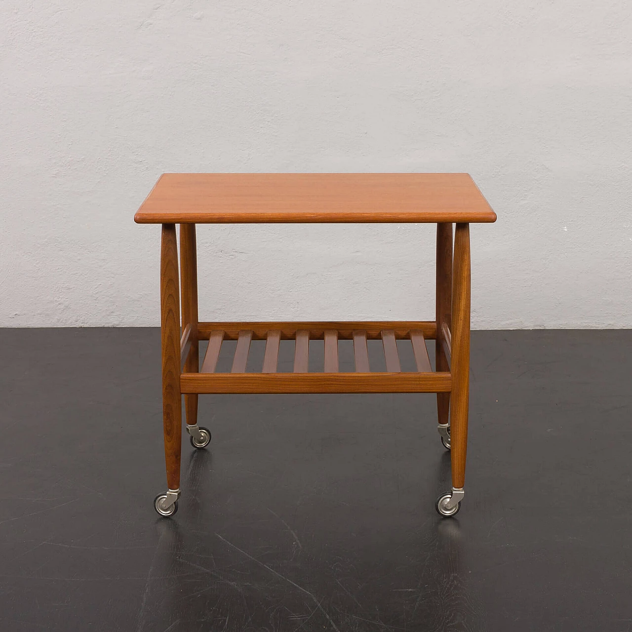 Danish teak coffee table with double shelf and casters, 1960s 3