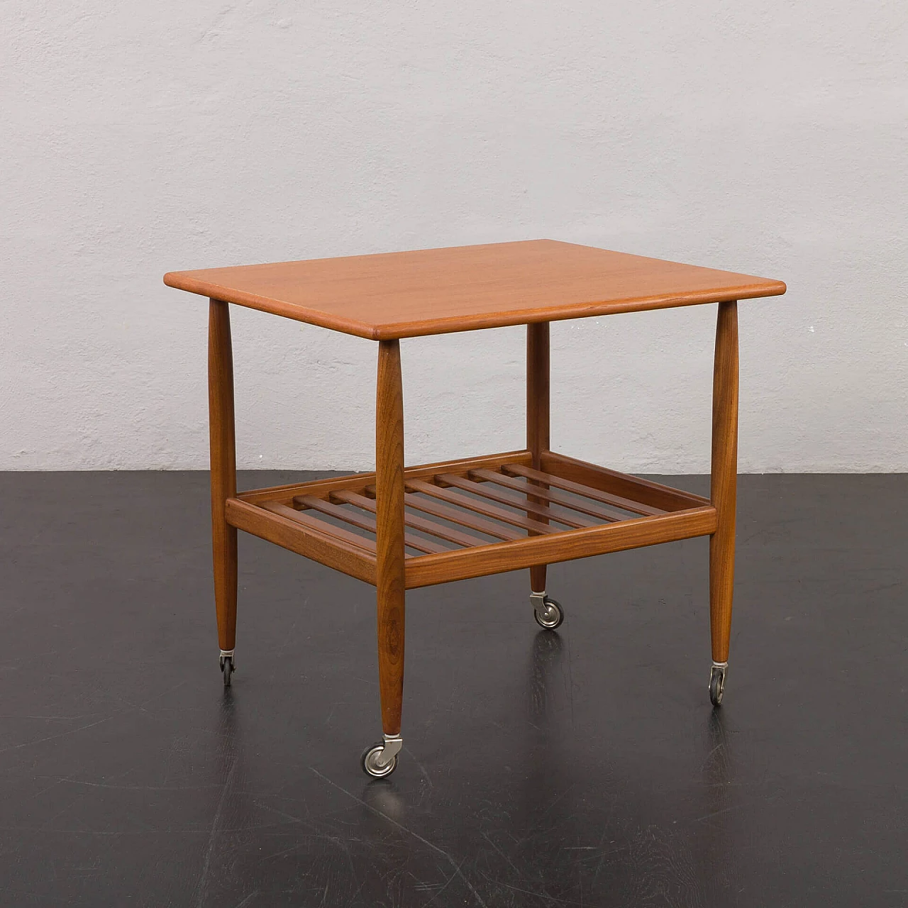 Danish teak coffee table with double shelf and casters, 1960s 4