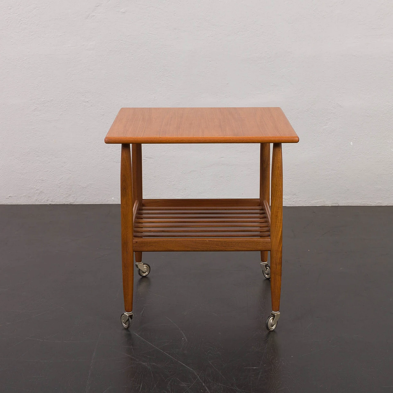 Danish teak coffee table with double shelf and casters, 1960s 5