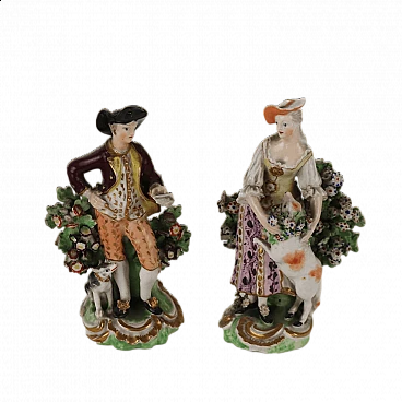 Pair of polychrome porcelain figurines, 19th century