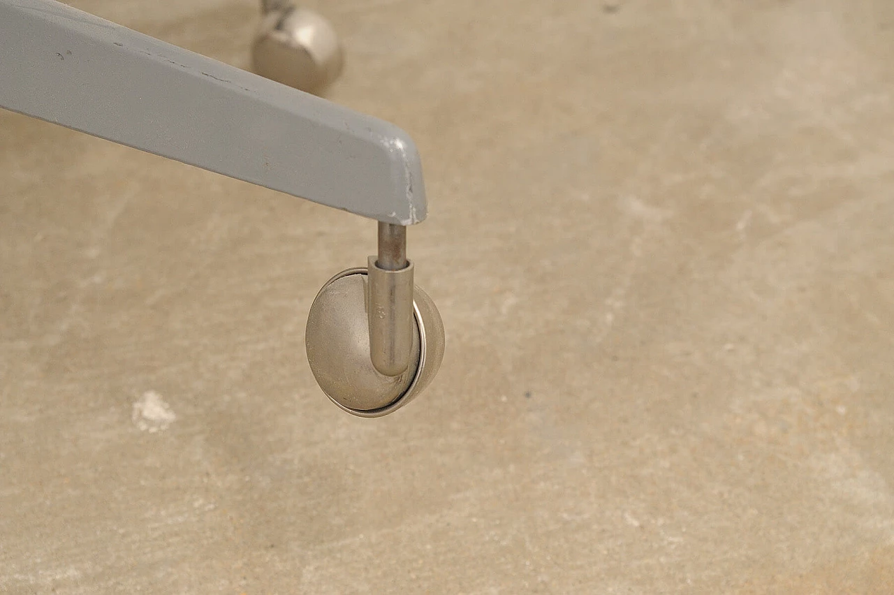 Plastic, fabric and iron swivel chair by Kovona, 1950s 20