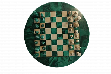 Round malachite chessboard with pawns