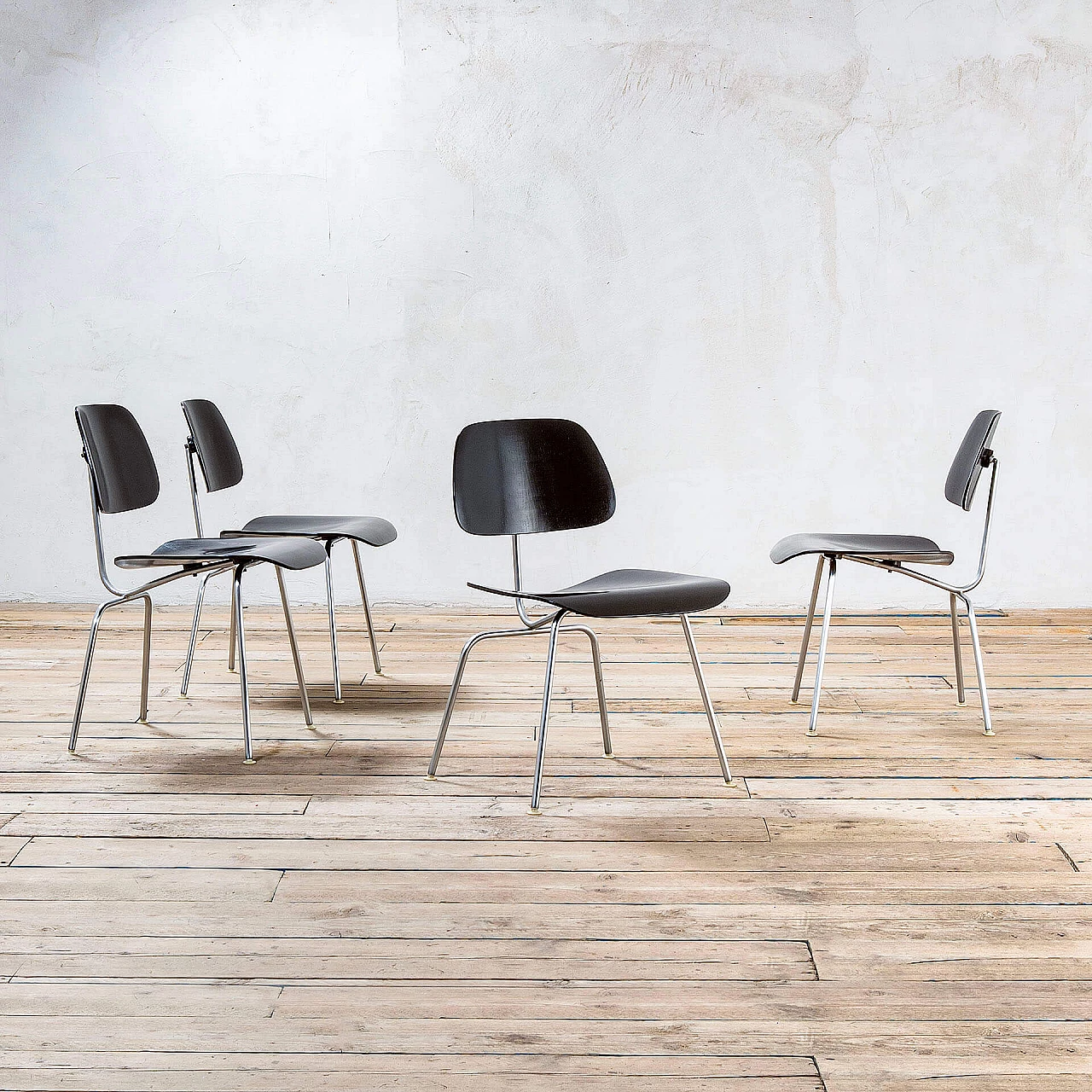 4 DCM chairs in steel and black lacquered wood by Charles Eames, 1940s 1