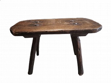 Solid spruce milking stool, early 20th century