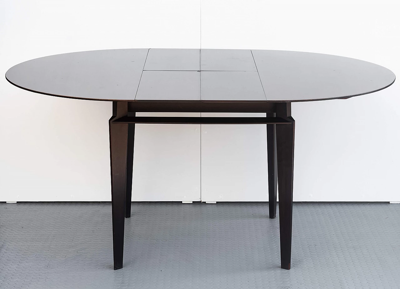 Extendable wooden table by Edmondo Palutari for Vittorio Dassi, 1950s 11