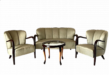 Pair of Art Deco armchairs, sofa and coffee table in solid walnut, 1930s