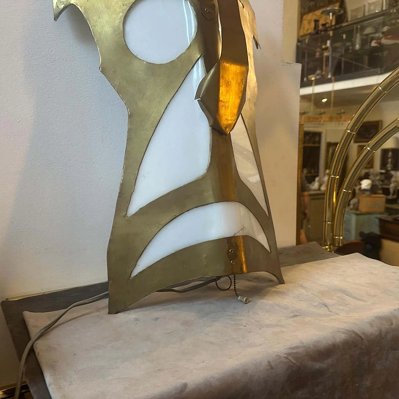 Brass and white plexiglass wall lamp with tribal mask, 1980s 8