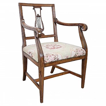 Louis XVI solid walnut armchair with carved lyre back, 18th century