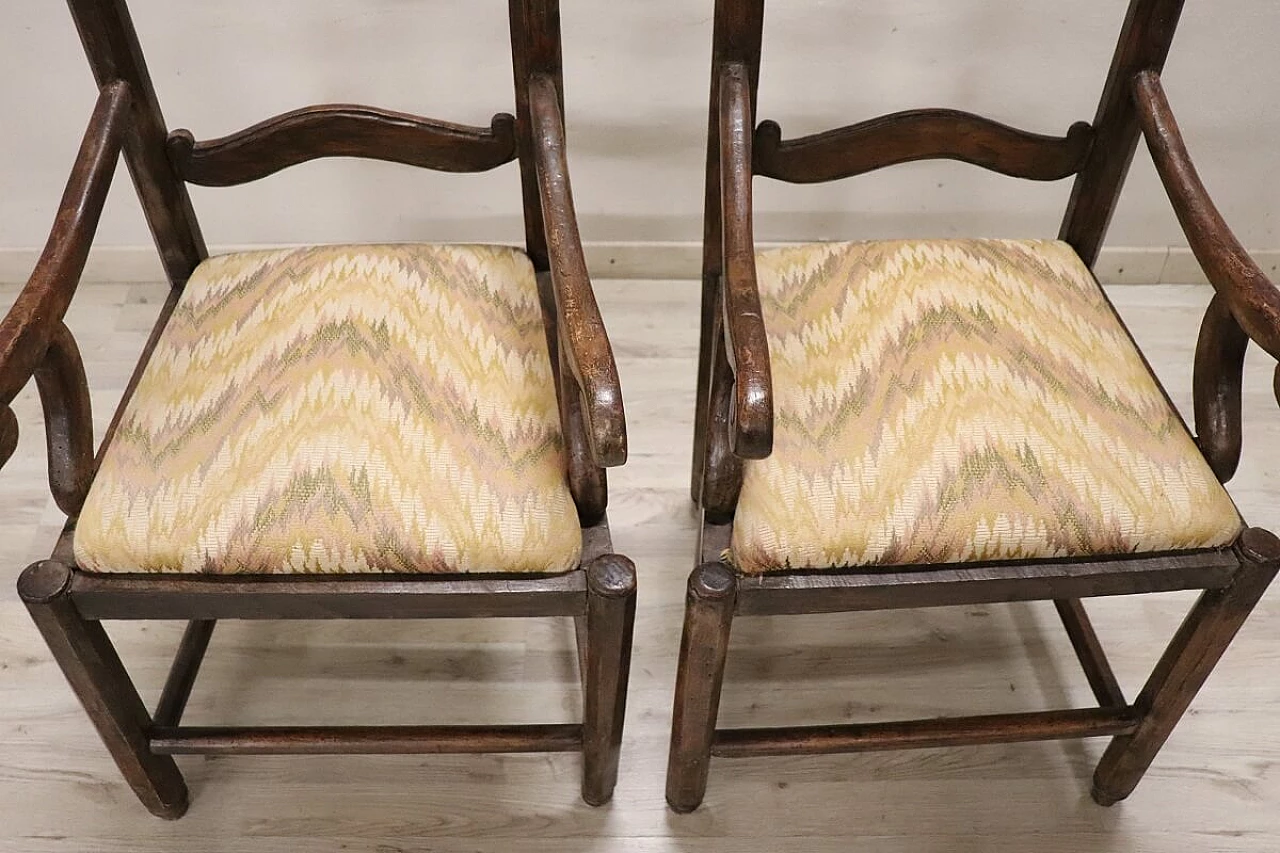 Pair of Louis XVI solid walnut armchairs, 18th century 10