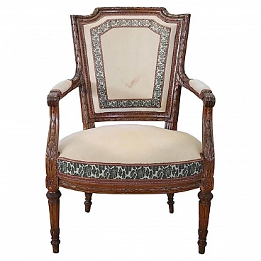 Louis XVI solid walnut upholstered armchair, 18th century