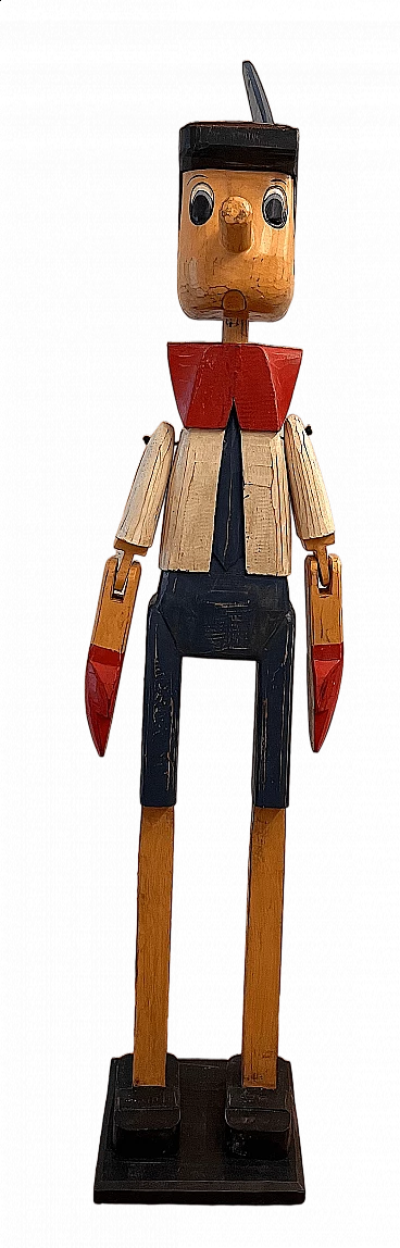 Wood Pinocchio sculpture with jointed arms, 1960s