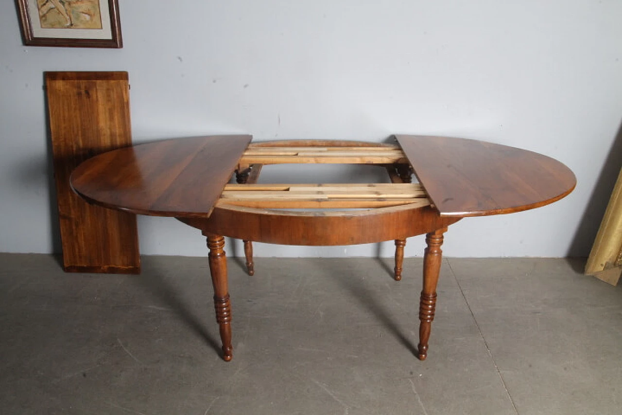 Tuscan oval solid walnut extendable table, mid-19th century 13