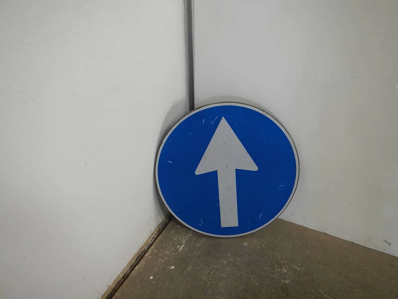 Road sign with directional arrow, 1990s 1