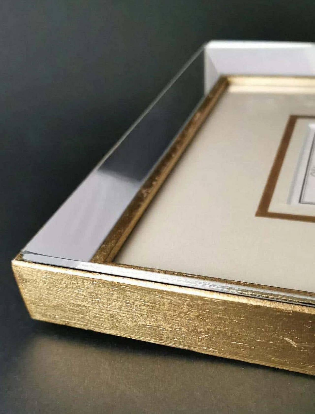 Stampa olandese incisa raffigurante lo stemma dei duchi di Mirandola con cornice specchiata, '600 12