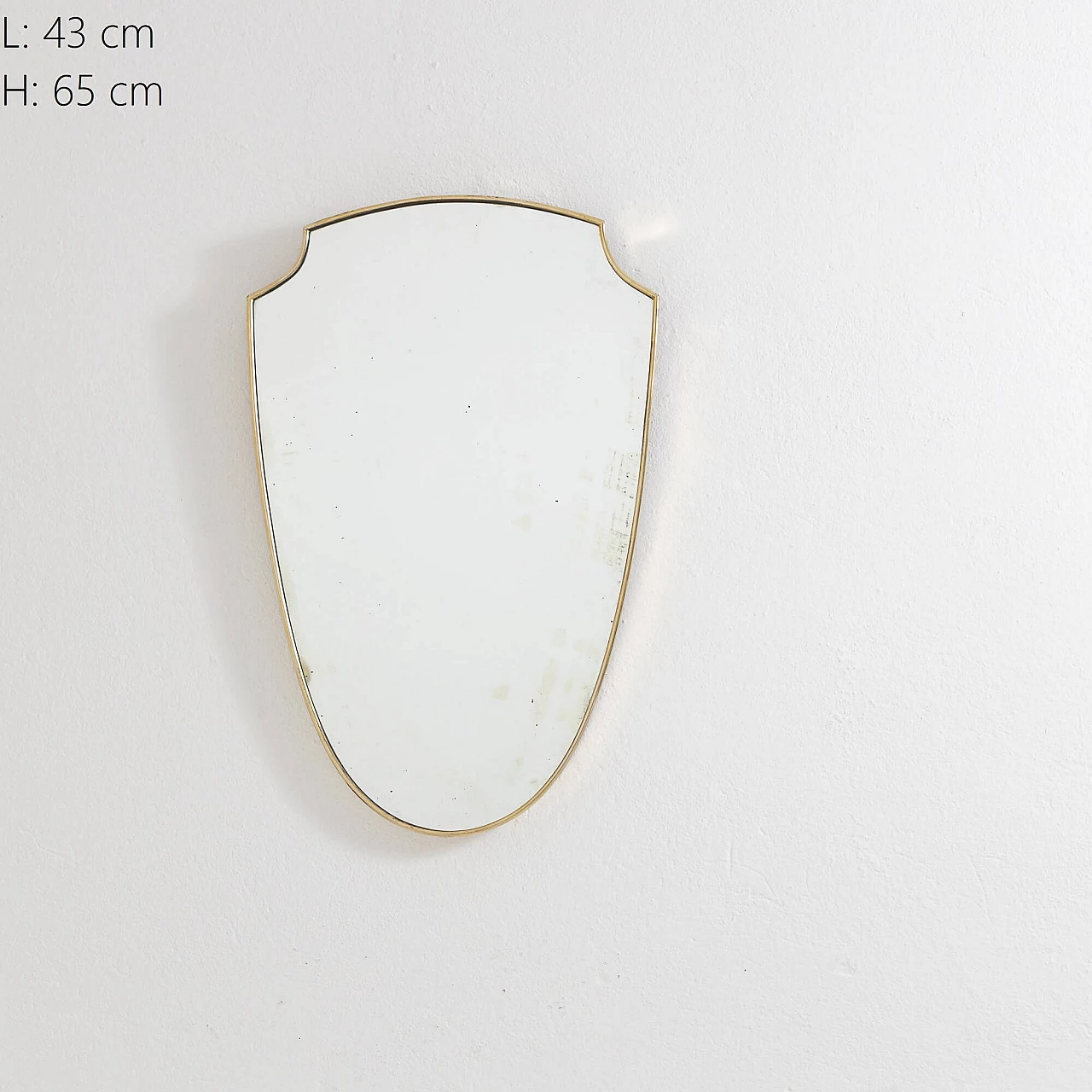 Shield wall mirror with brass frame, 1950s 1