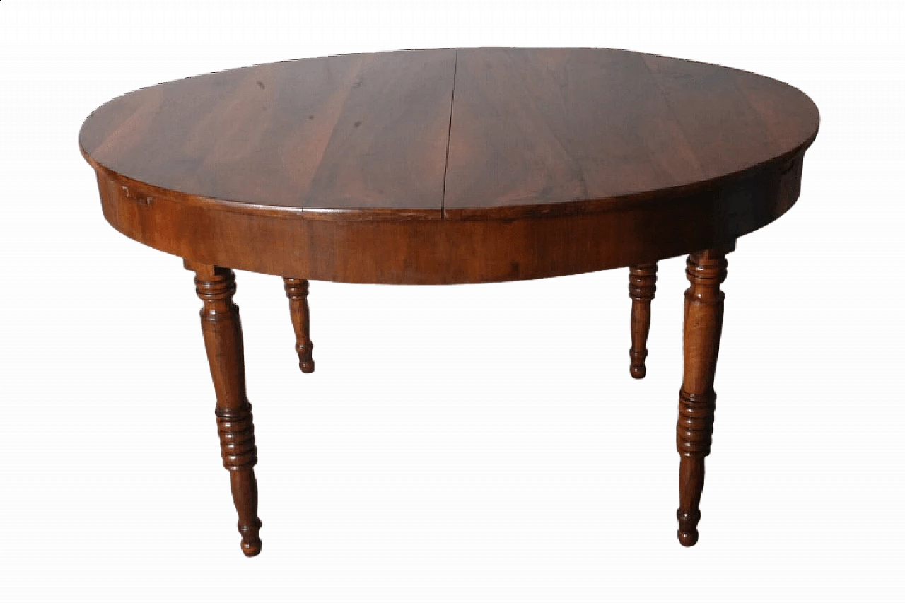 Tuscan oval solid walnut extendable table, mid-19th century 19