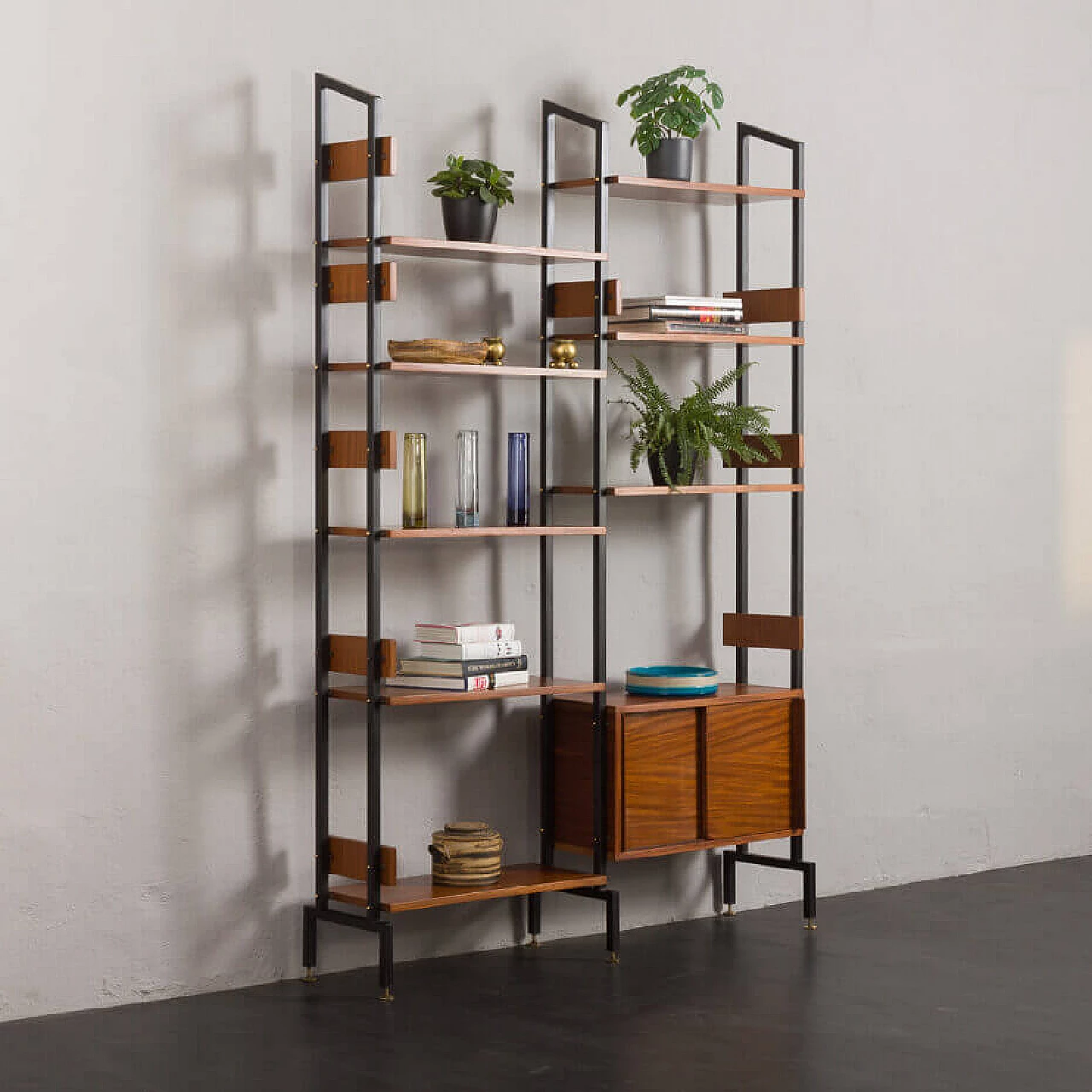 Two-bay bookcase with sliding doors and eight shelves, 1950s 2