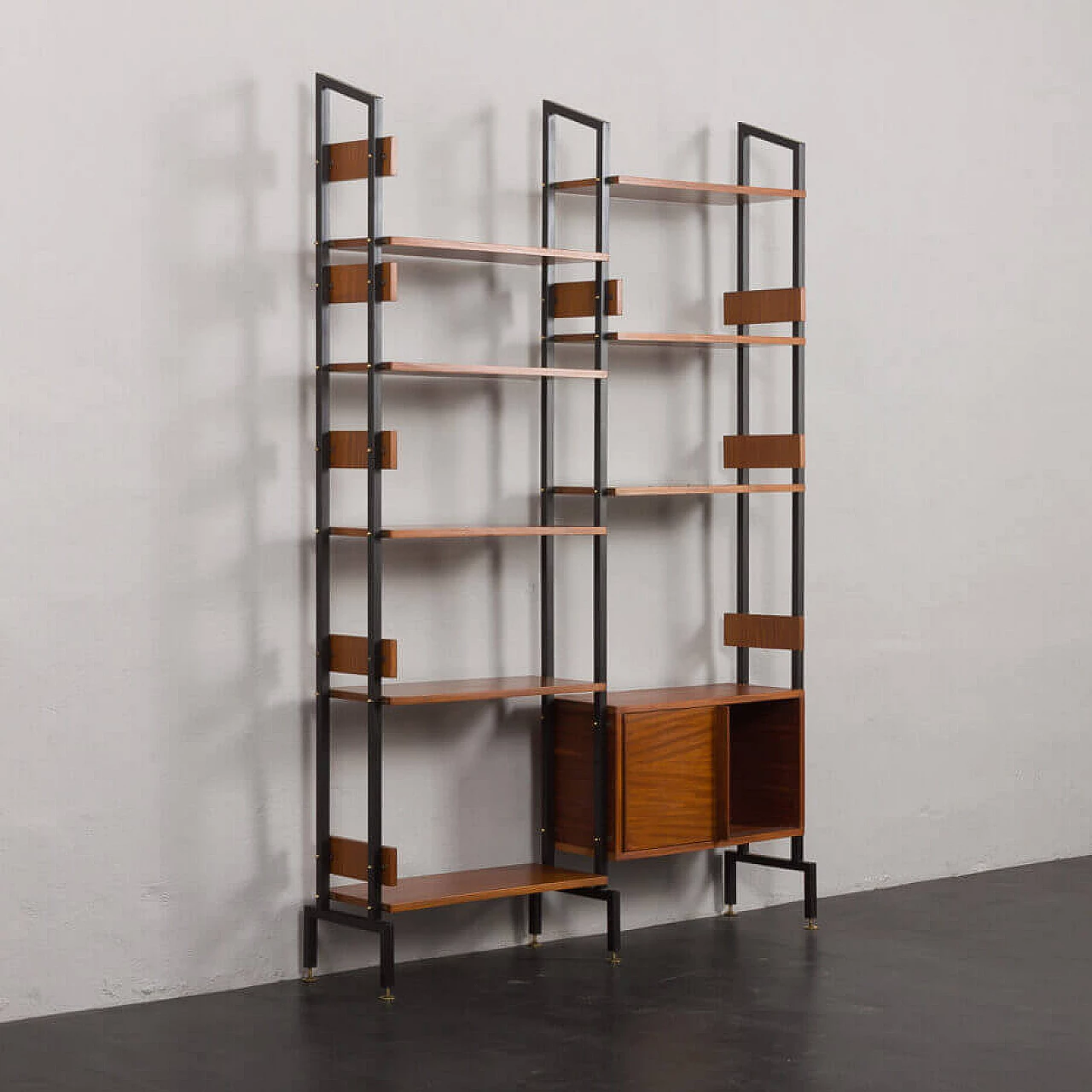 Two-bay bookcase with sliding doors and eight shelves, 1950s 4