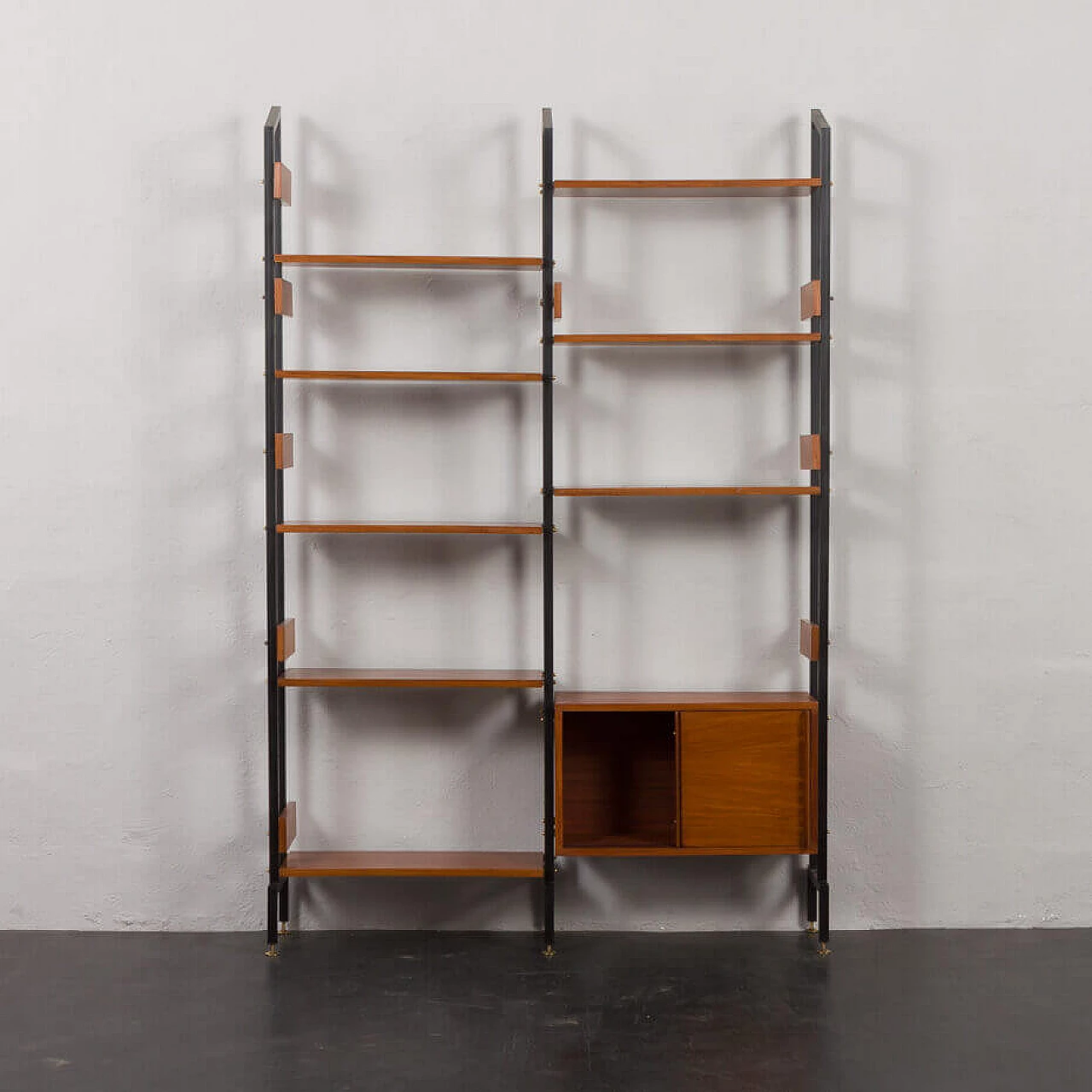 Two-bay bookcase with sliding doors and eight shelves, 1950s 5
