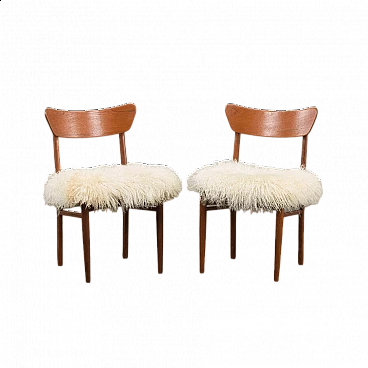 Pair of Danish solid teak chairs with long-haired sheepskin in the style of Hans Wegner, 1960s