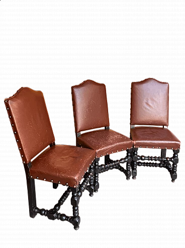 3 Chairs in oak and burgundy hide with studs, 19th century