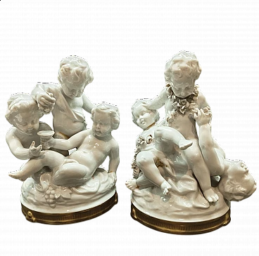 Groups of cupids, pair of Capodimonte porcelain sculptures, 1950s