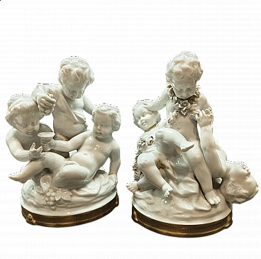 Gruppi di amorini, coppia di sculture in porcellana di Capodimonte, anni '50