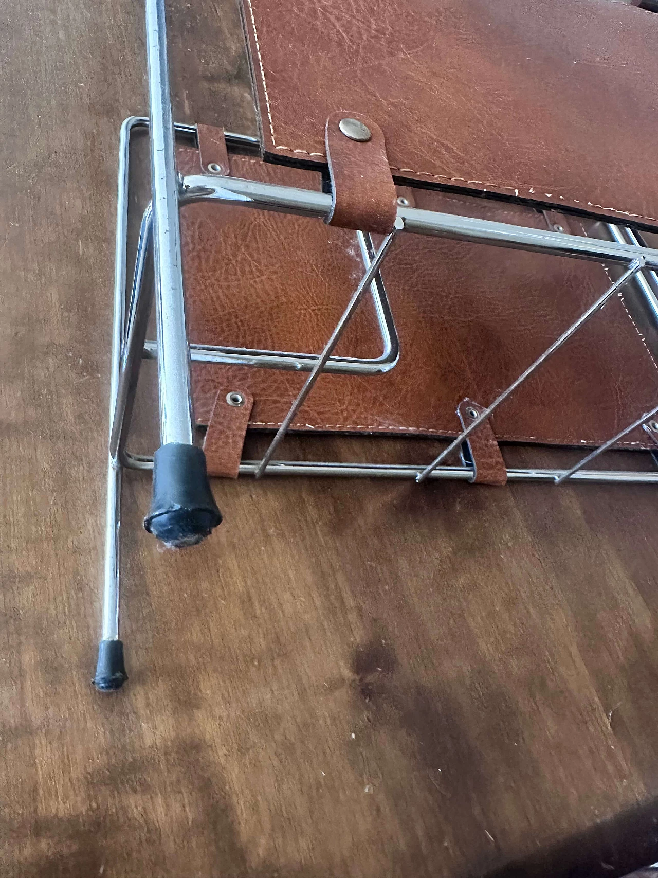 Stainless steel and leather magazine rack, 1980s 4