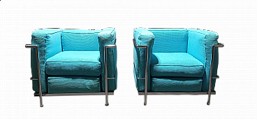 Pair of LC2 armchairs in light blue ribbed cotton by Le Corbusier, P. Jeanneret, C. Perriand for Alivar, 1989