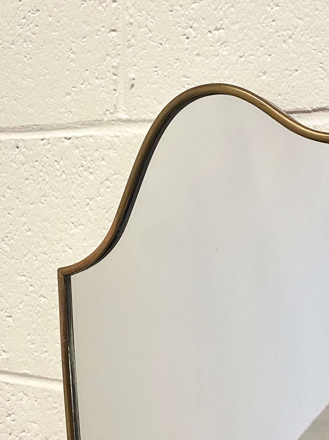 Mirror with shaped brass frame in the style of Gio Ponti, 1950s 4