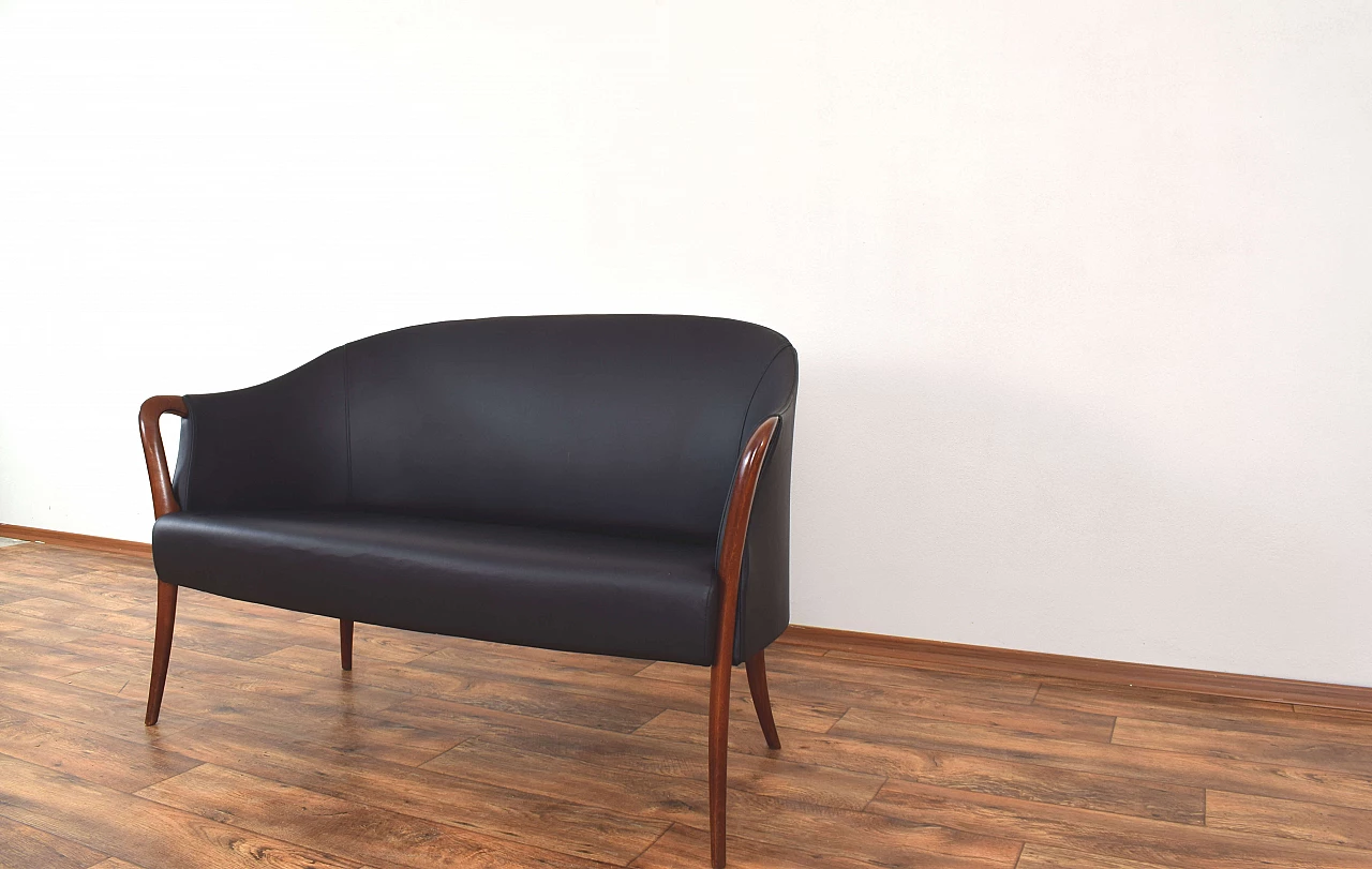 Solid beech and black leather sofa, 1960s 9